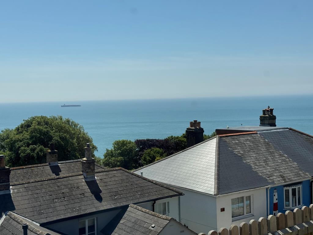 Lot: 147 - COTTAGE FOR IMPROVEMENT WITH SEA VIEWS - The View From the Front of the Property